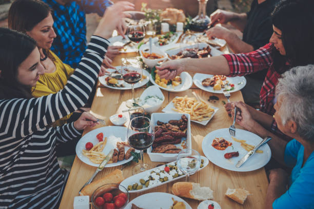 istock Family dining outdoor 880200942