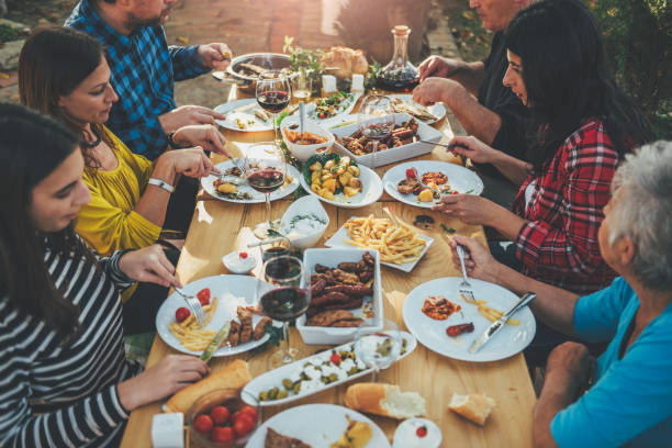 istock Family dining outdoor 880205248
