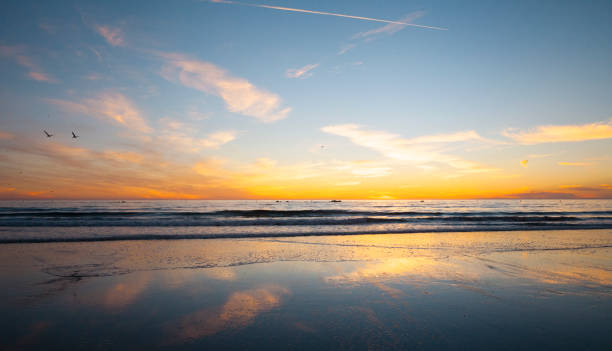 istock Santa Monica beach- ocean and sky at sunset 880207600