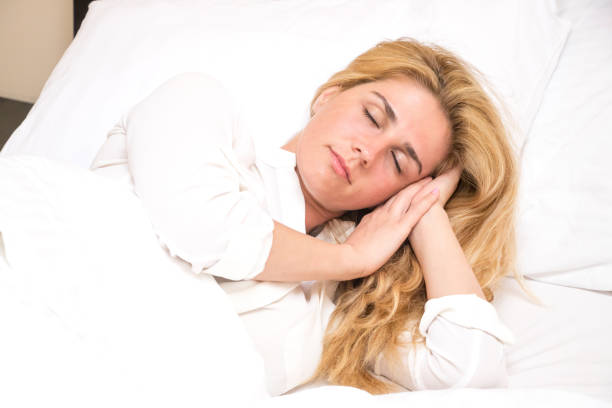 istock Girl sleeping in bed 880211458