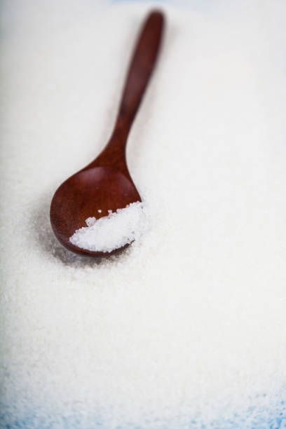 istock Wooden spoon with sugar 880214288