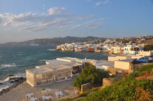 Mykonos, Greece - May 2015: View of famous waterfront cafes and houses of MYkonos town on greek island, in 2015