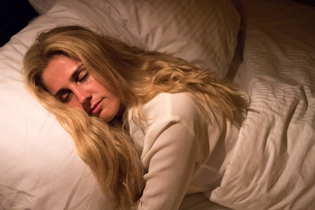 istock Girl sleeping in bed 880226840