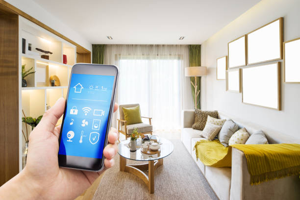 istock smart phone with smart home with modern living room 880232264