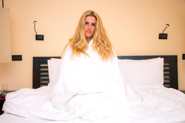 istock Beautiful girl in bed 880243316
