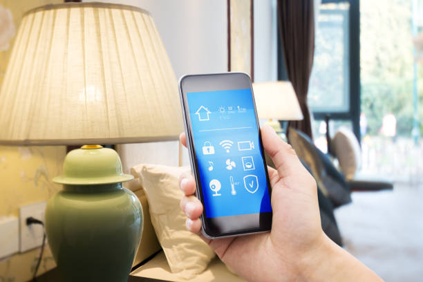 istock smart phone with smart home with modern bedroom 880248104