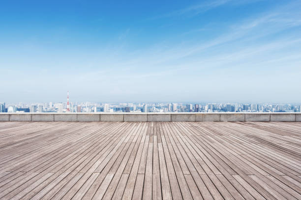 istock empty wooden floor with modern cityscape 880253324