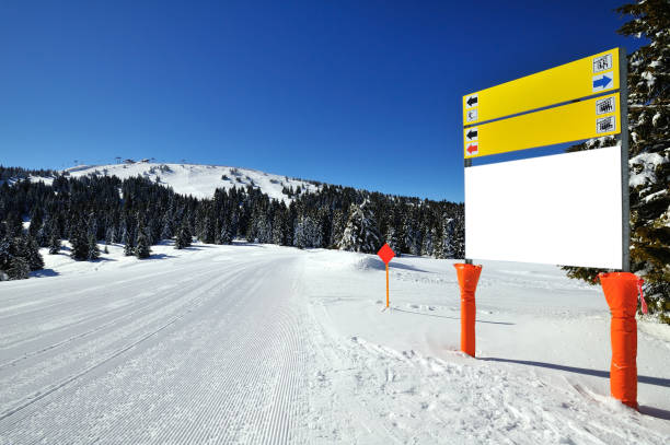 Winter vacation in mountain. Ski, Sun, Snow and fun