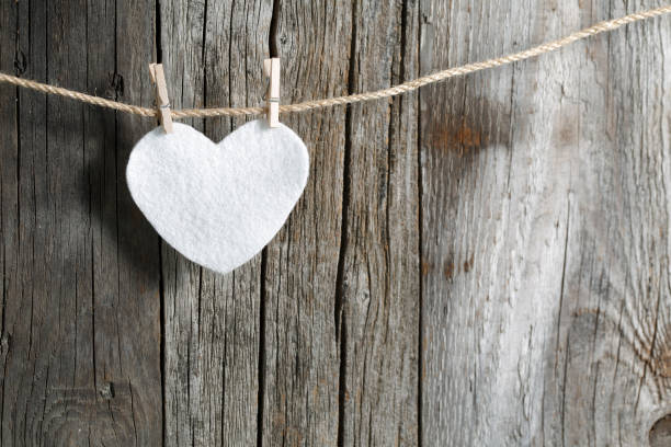 Love heart on Clothesline wood background
