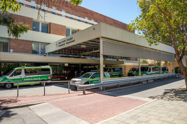 Ambulance vehicles parkes at Emergency Department entrance, Royal Perth Hospital, Perth City, Western Australia stock photo