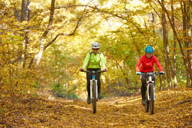 istock Woman biking outdoor 880294122