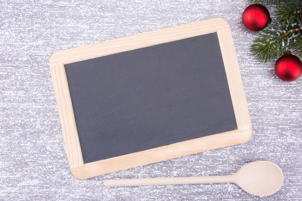 istock Board for the copyspace. Christmas and New Year. Background light gray, Top view. 880305564