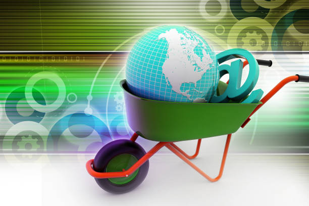 istock Wheelbarrow carrying earth and email sign 880305644