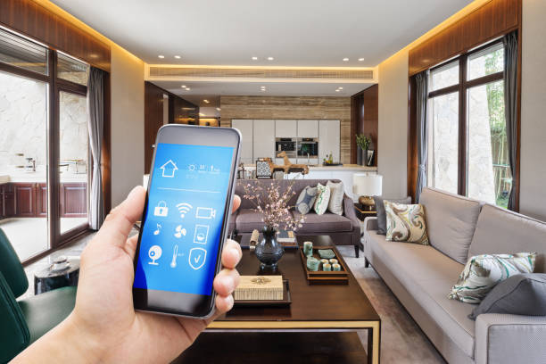 istock smart phone with smart home with modern living room 880308582