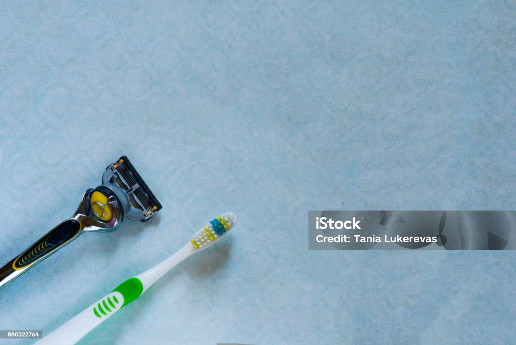 Toothbrush Razor Razor And Toothbrush On Ble Background View From Above Stock Photo ...