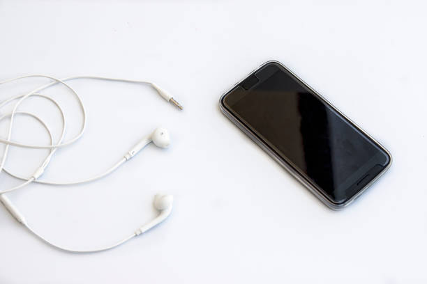 istock Mobile phone and earphones 880338156