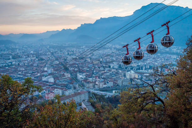 istock Grenoble and cable cars at dusk 880338750