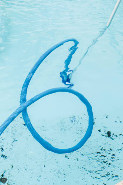 istock Pool cleaning equipment in the dirty pool 880340890