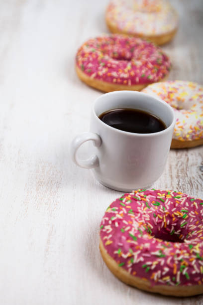istock Donuts and a cup of coffee close-up 880341190