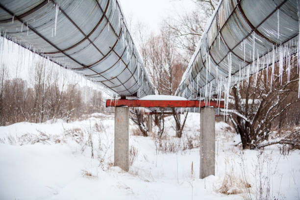 istock Pipelines with icicles hanging from the pipes. 880353200