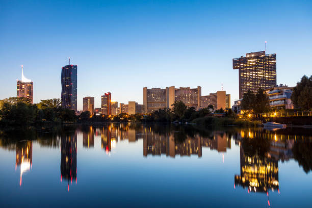istock Vienna skyline on the Danube river at night 880356730