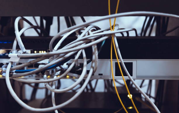 istock Network switch and UTP ethernet cables close-up in server room 880359880