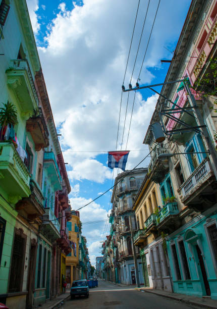 istock Street with Cuban flag in Havana 880366312