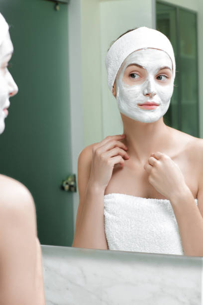 istock woman with a mask on her face 880372796
