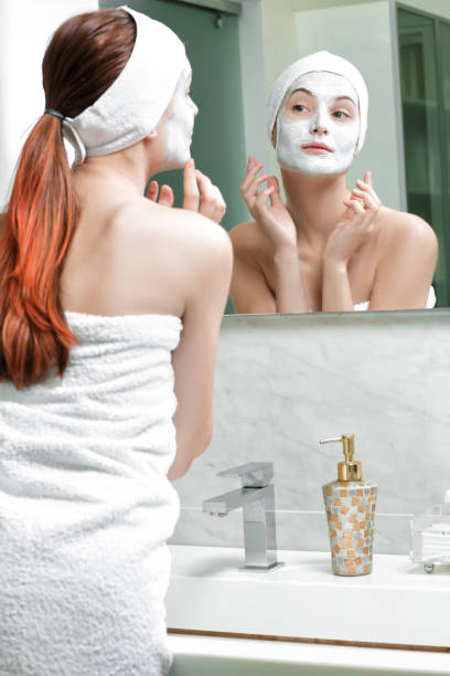 istock woman with a mask on her face 880375132