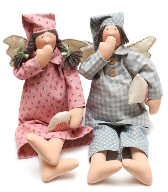 istock Bedtime concept - handmade dolls yawn 880375500