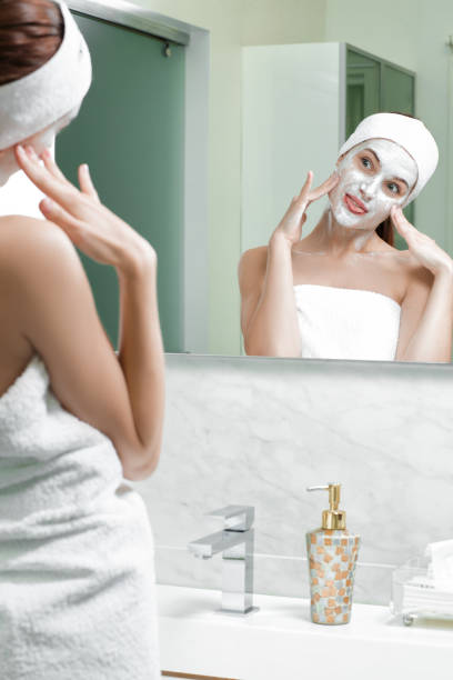 istock woman with a mask on her face 880376248