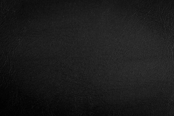 istock black paper texture or background with spotlight, soft focus, dark tone 880379122