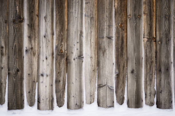 Old vintage wooden wall with snow. Winter and christmas background. stock photo