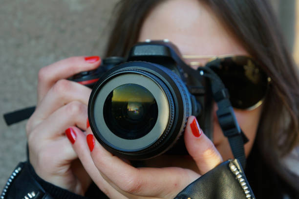 istock Girl taking photos 880383438