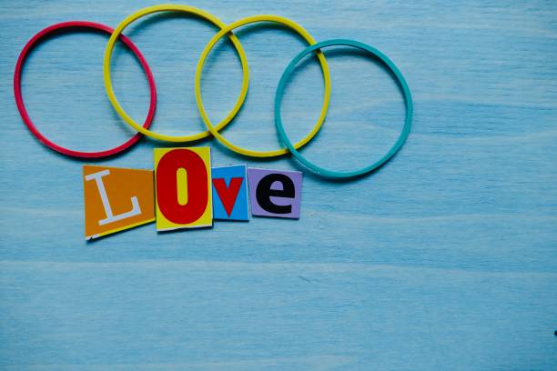 istock Word Love  lying on blue wooden background 880394968