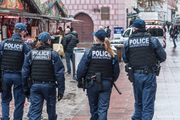 police patrol at christmas market Mulhouse - France - 25 November 2017 -  police patrol at christmas market mulhouse photos stock pictures, royalty-free photos & images