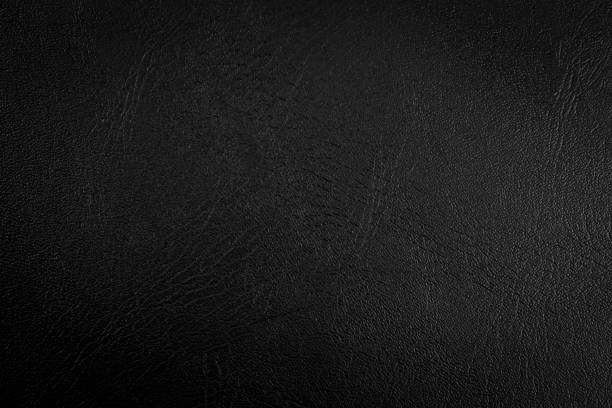 istock black paper texture or background with spotlight, soft focus, dark tone 880400676
