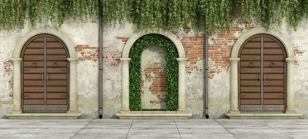 Door features of an apartment along the streets of Rome Italy