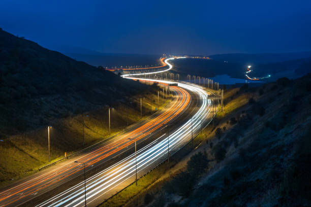 istock A motorway in England sweeps through the countryside at night 880444246