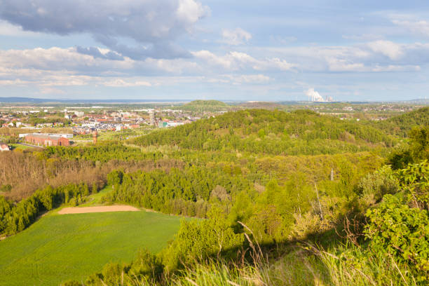 istock Distant Power Station in Green Landscape 880446756