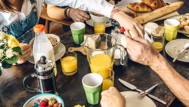 istock french family at breakfast table 880459794