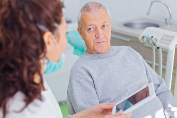 istock Man at dental checkup 880460390