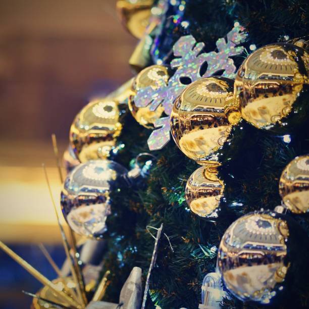 istock Christmas decoration. Abstract colorful background with Christmas tree. 880465774