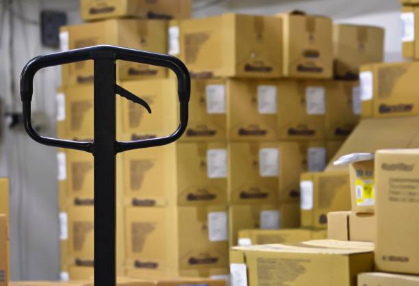 istock Hand Pallet Truck Inside the Warehouse. 880466502