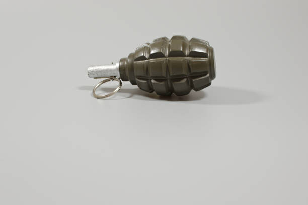 istock A hand grenade in landscape orientation with copy space. 880471986