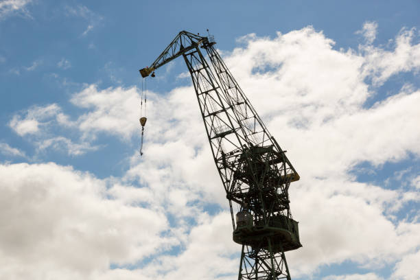 stocznia gdanska industrial factory with shipyard cranes - pomorskie province imagens e fotografias de stock