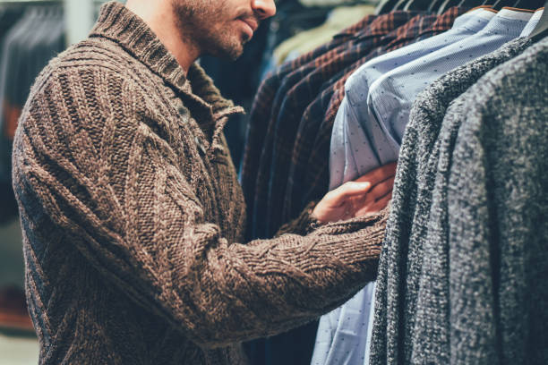 istock Young blonde man doing shopping in a store 880499756