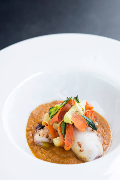 istock gourmet stuffed squid with vegetables in spicy pumpkin curry puree 880519942