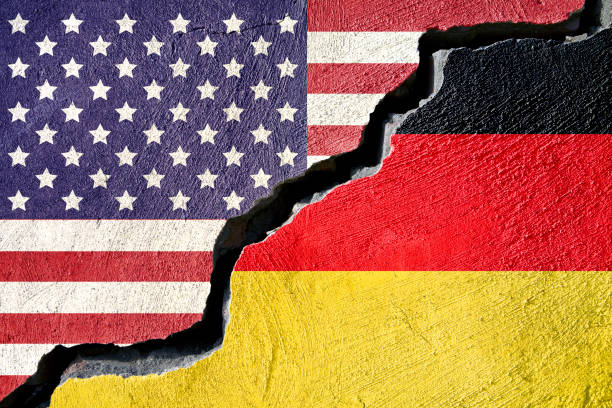 istock Concept american and Germany flag on cracked background 880541198