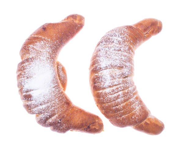 istock Fresh croissants sprinkled with powdered sugar 880556780